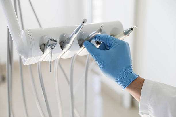 Professional Tooth Extraction technician working in Tipton County County, IN